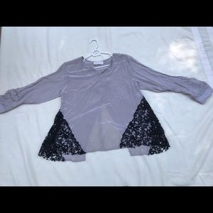 Fun top to dress up or down by Love Sam